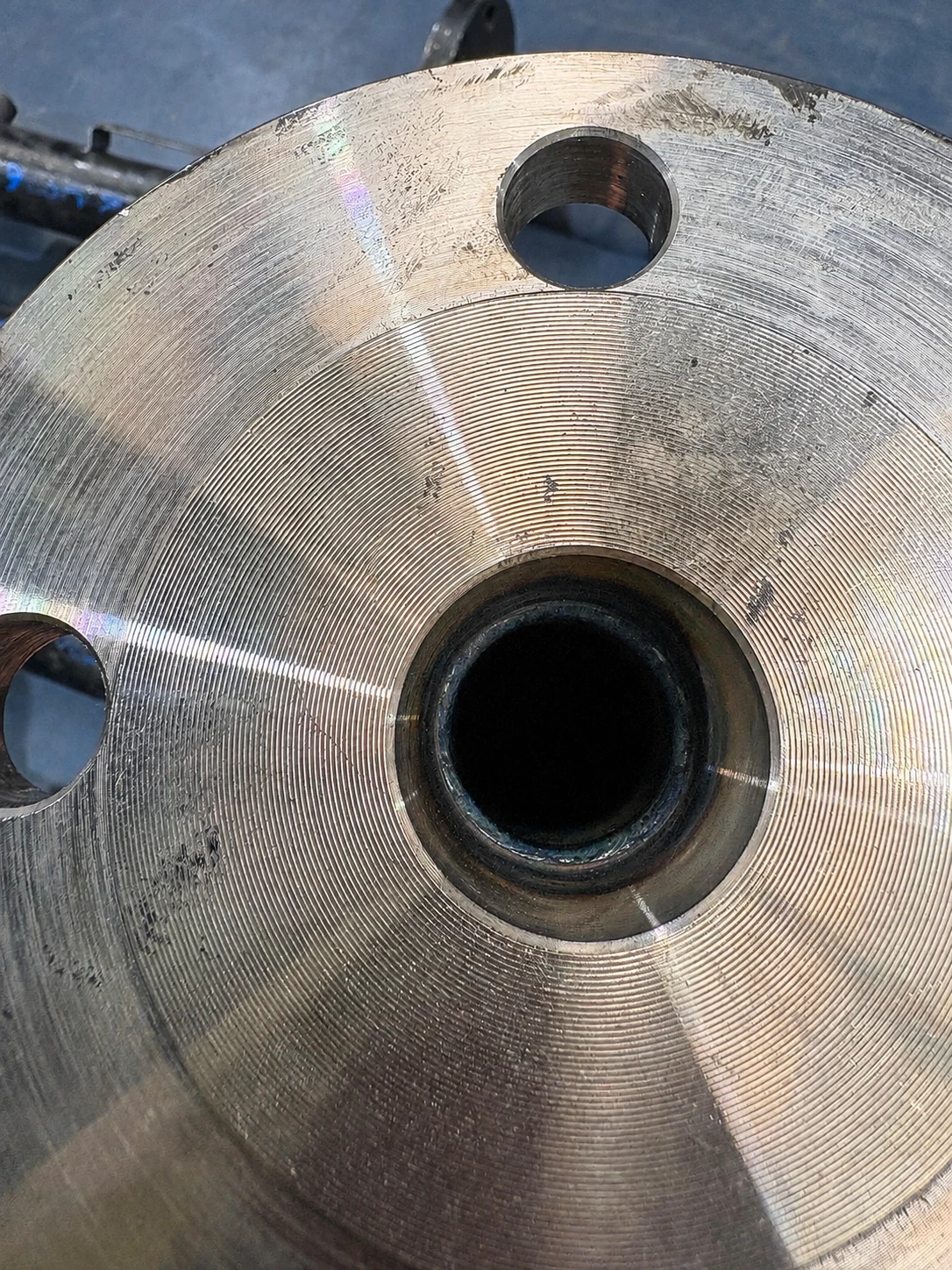 Close-up inspection of a fabricated pipe-spool flange
