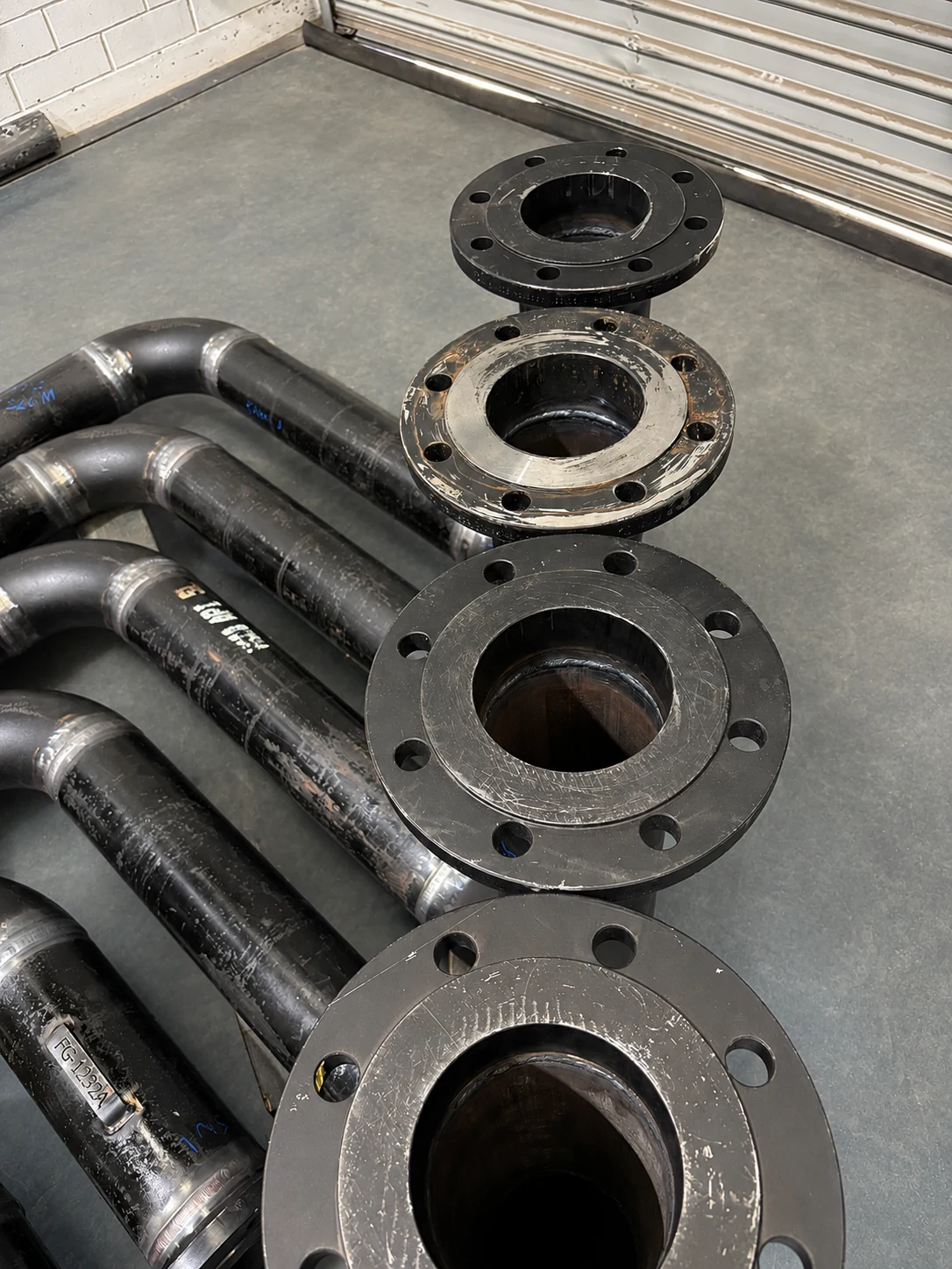 Flanged carbon steel pipe spools prepared for delivery